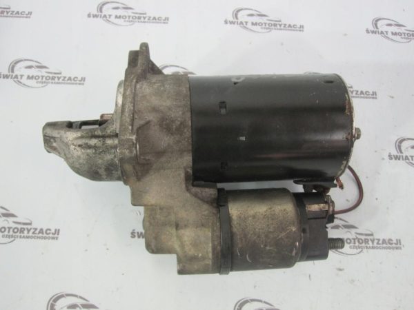 Opel Corsa 1.2 16V A12XER 85KM rozrusznik 55578921
